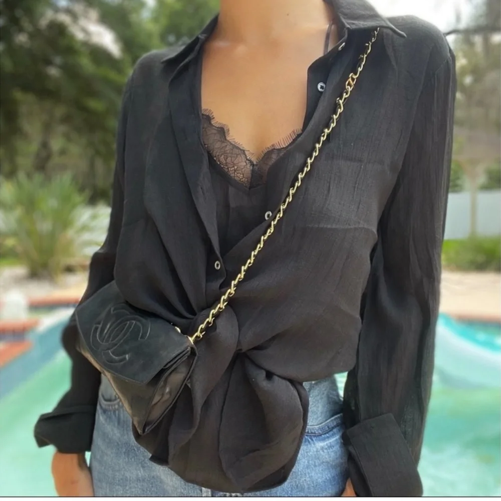 CHANEL Black and Gold Clutch with Iconic Design - Picture 2 of 10